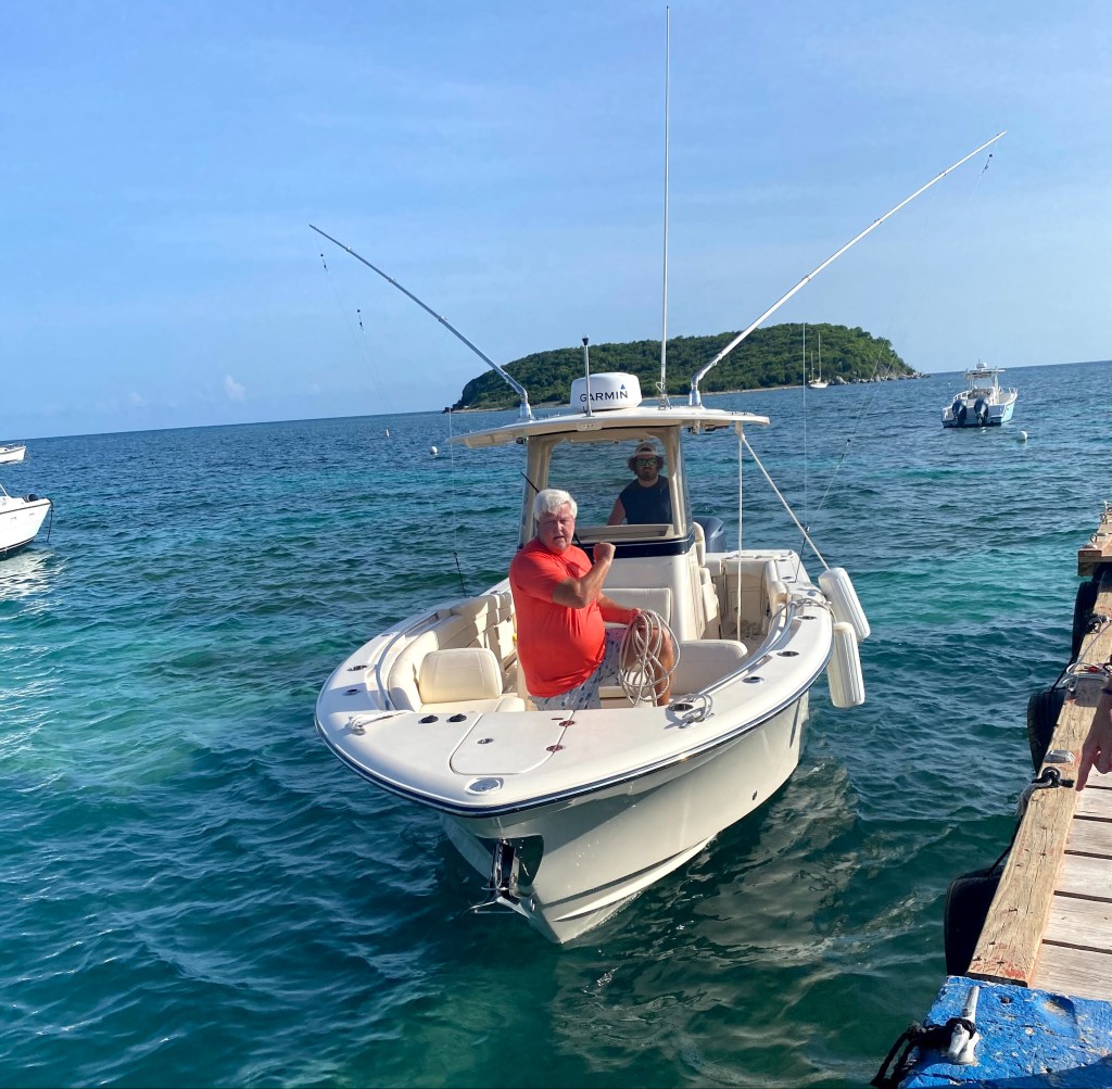 Captains Chris and Jackson Mason on their Grady White docking from a Vieques charter