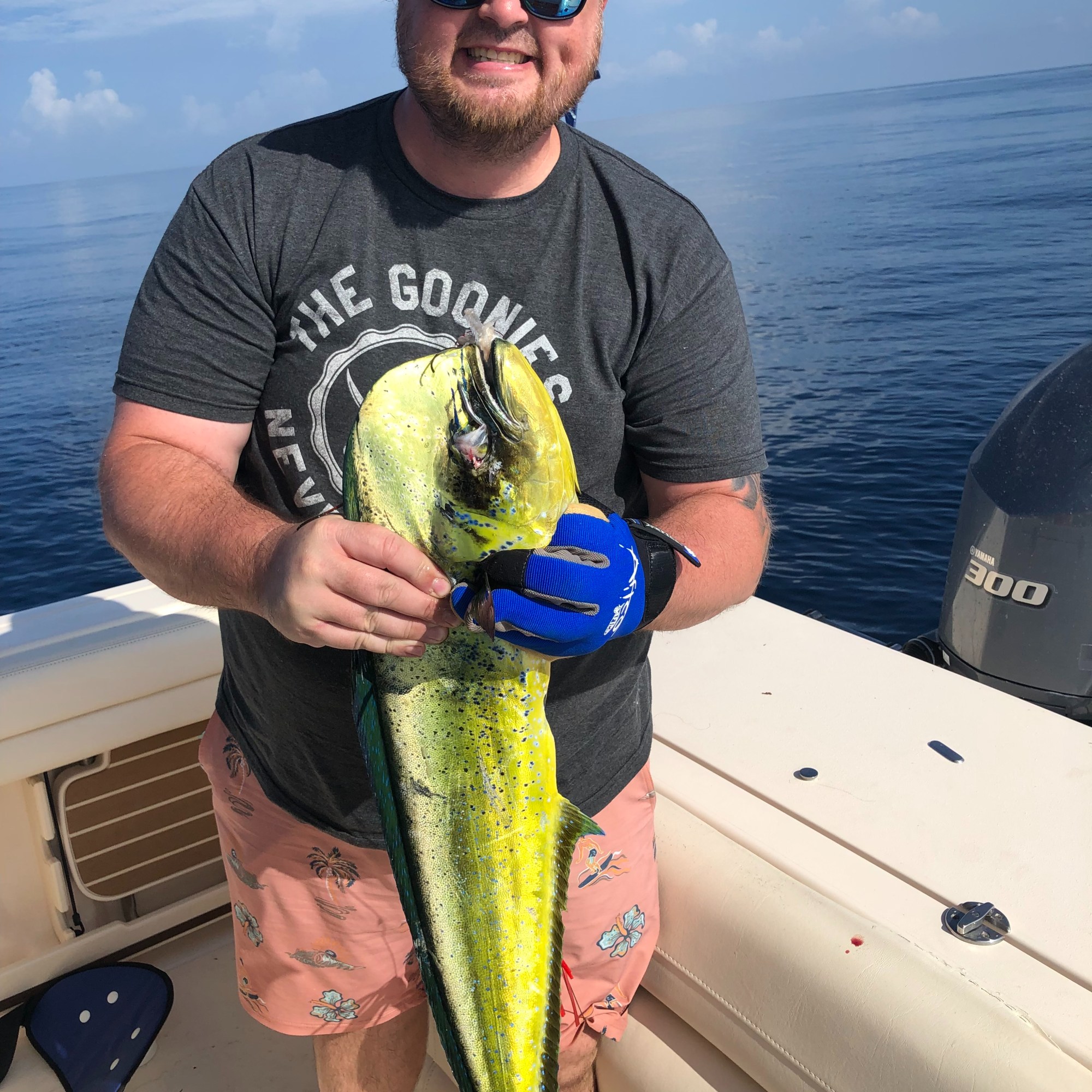 Man holding a Mahi on a Vieques deep sea fishing charter
