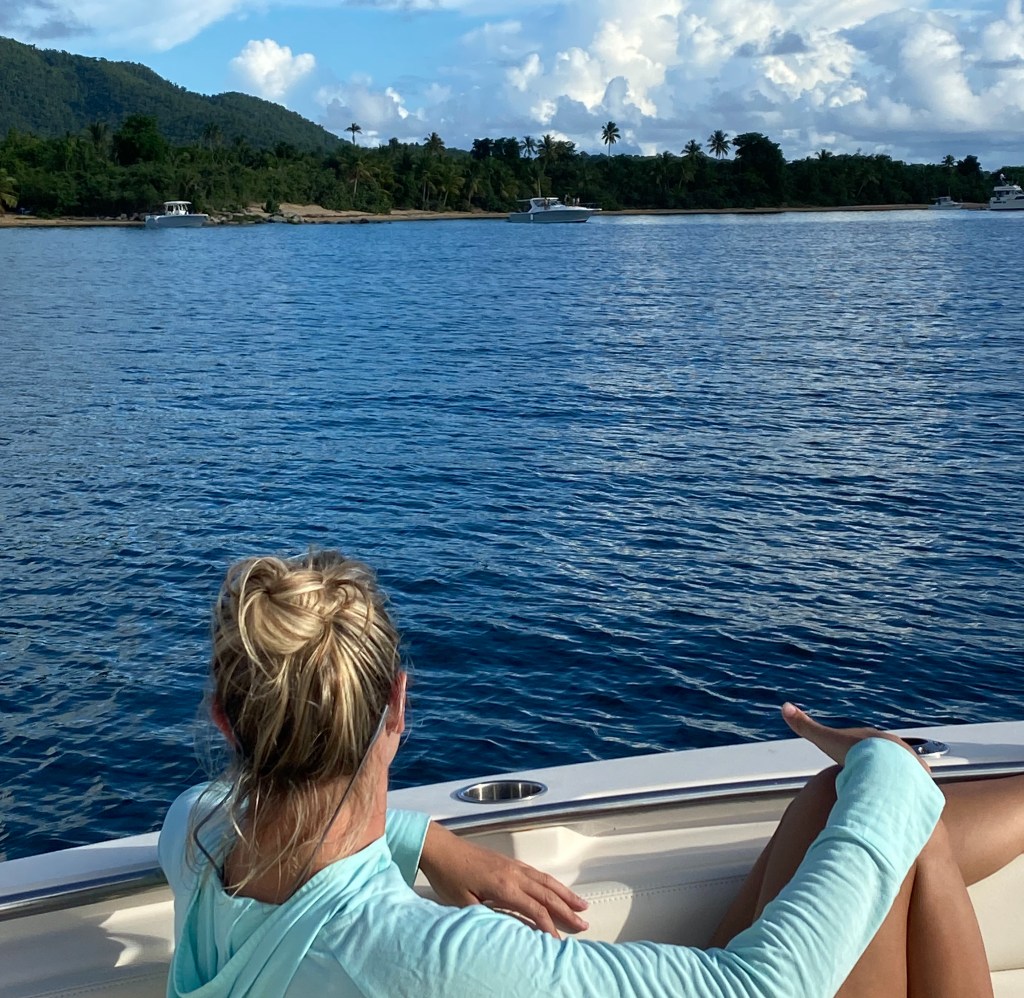 Women sitting on a boat while enjoying a Vieques boat charter